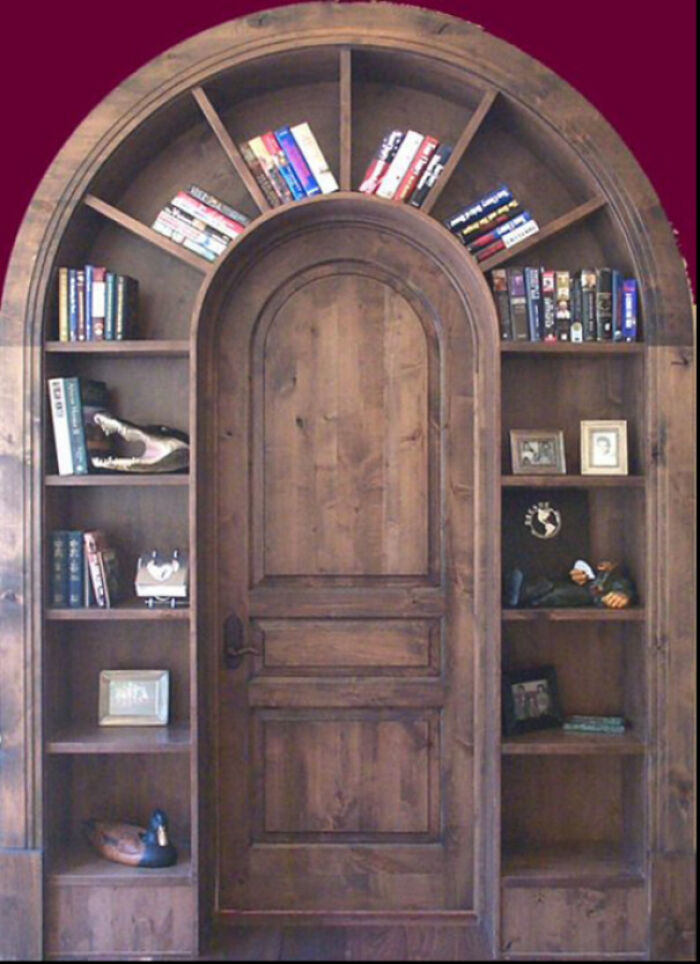 Stunning Arched Doorway With Built-In Bookshelves
