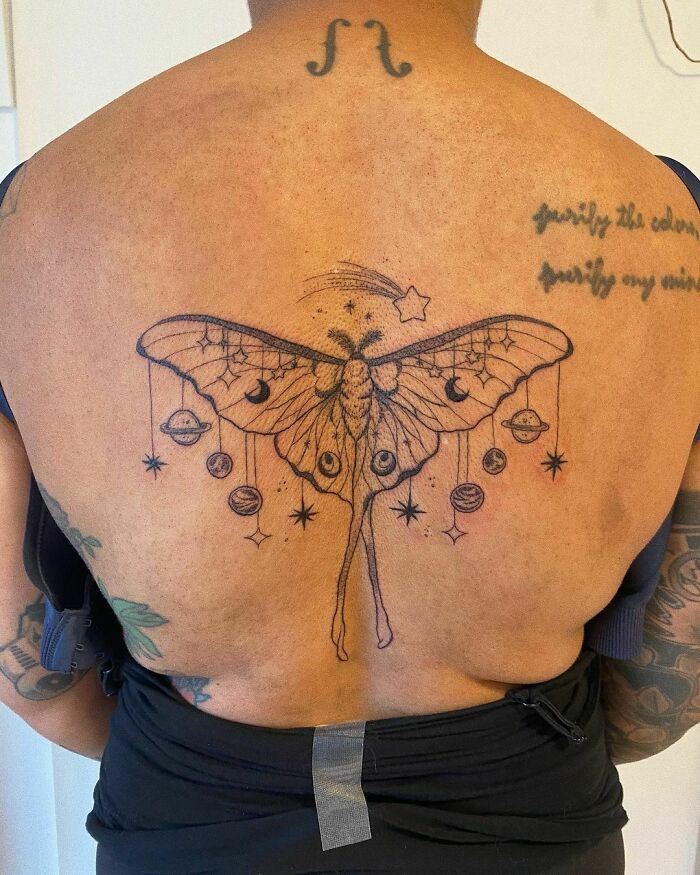 Cosmic Moth back tattoo 