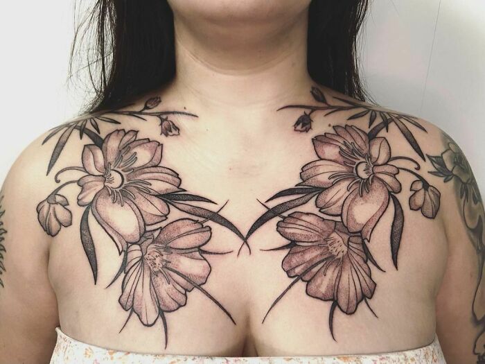 Chest tattoos of detailed floral design for nature tattoo lovers.