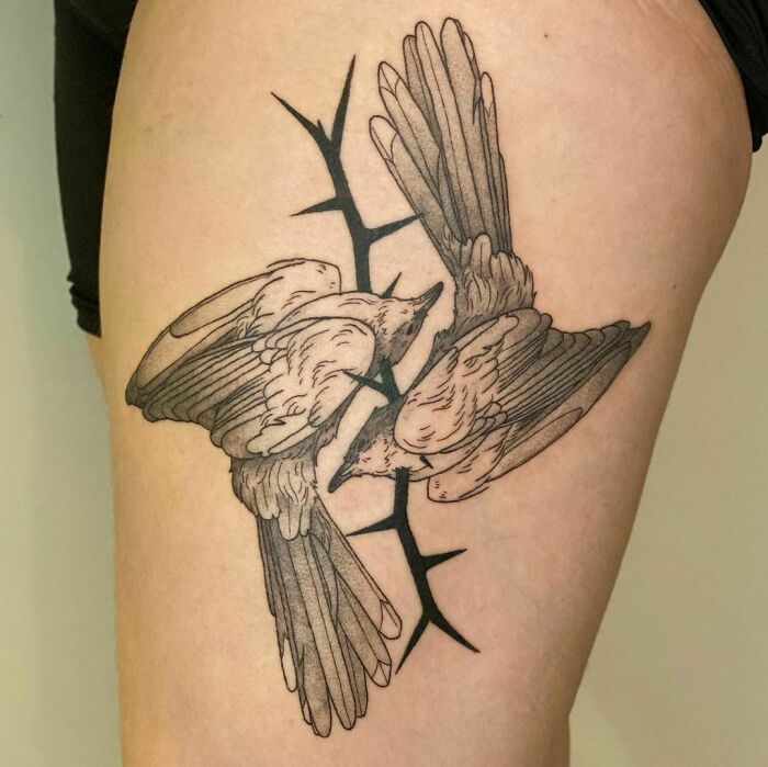 Double birds tattoo