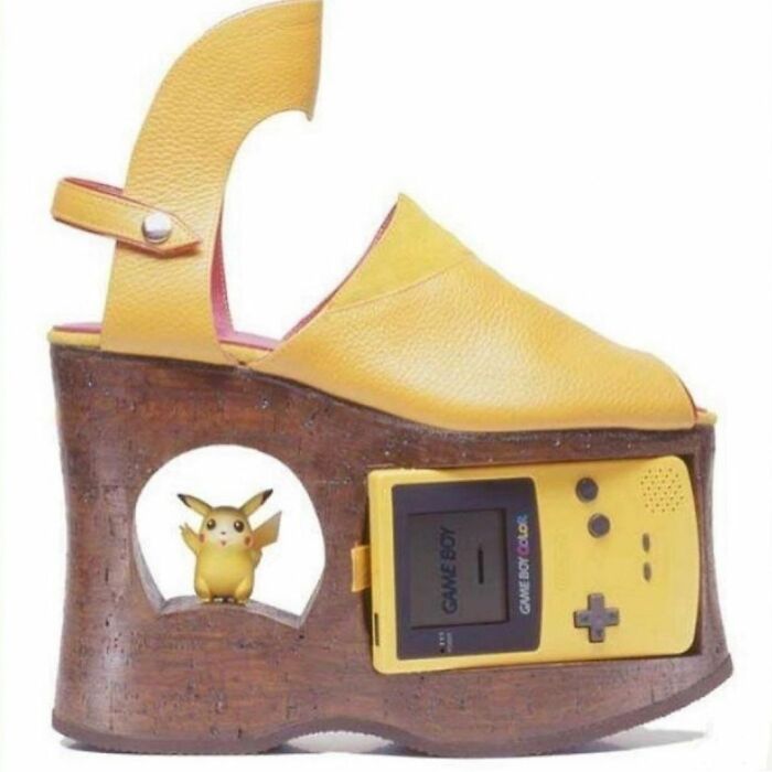 Yellow weird shoe with Game Boy and Pikachu integrated into the wooden platform heel.