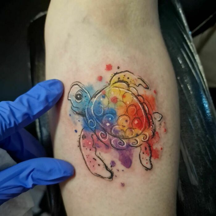 Watercolor tattoo of turtle