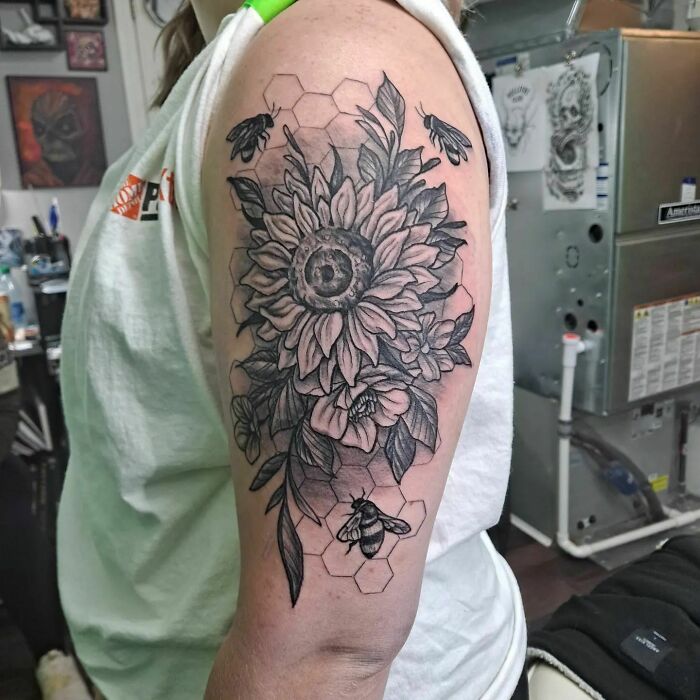 Flower and bees hand tattoo
