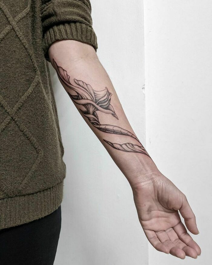Flower arm tattoo 