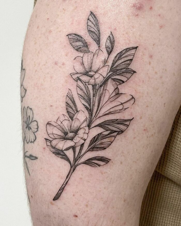Flower leg tattoo 