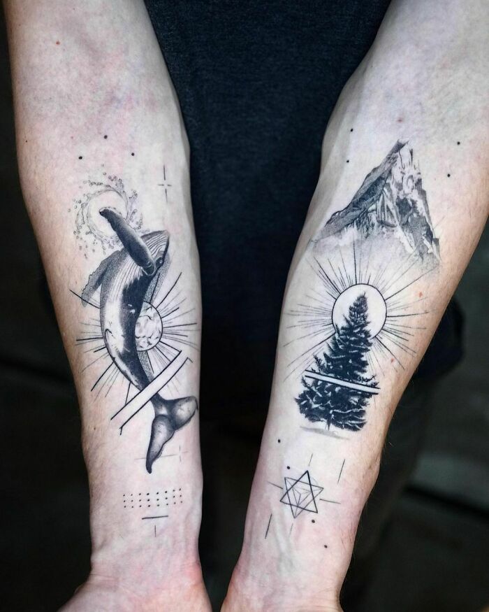 Whale and mountain hand tattoos 