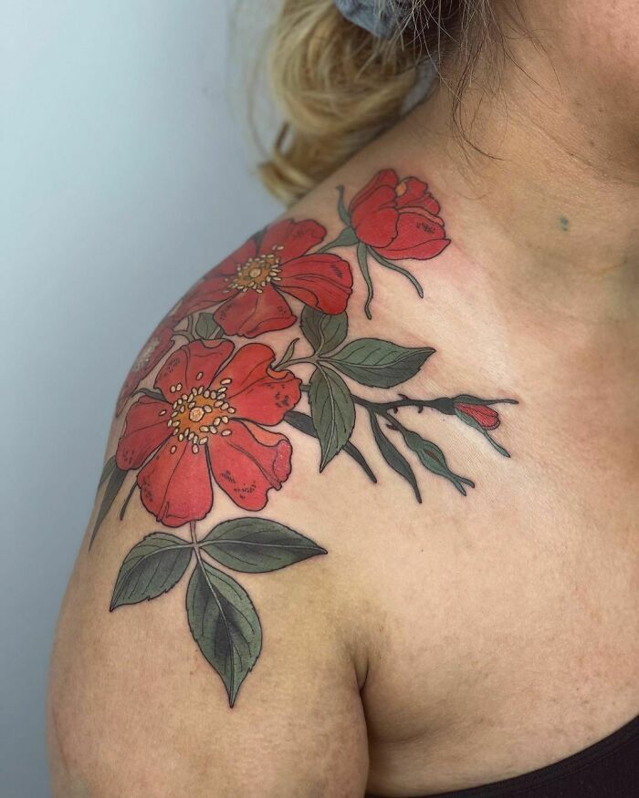 Colorful flower shoulder tattoo 