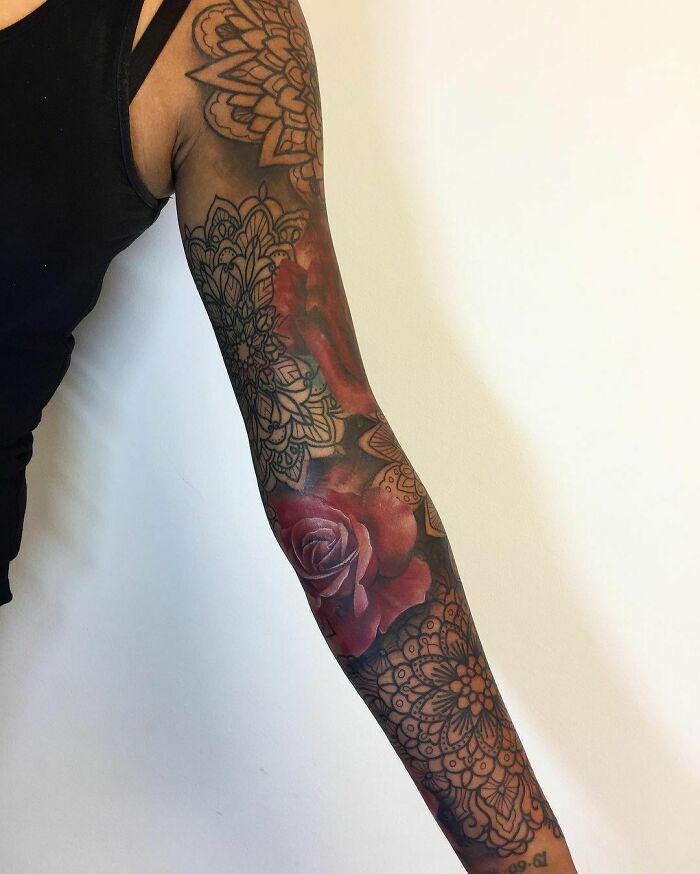 Watercolor flower and mandala sleeve tattoo