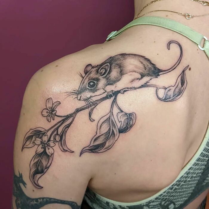 Mouse and branch shoulder tattoo 