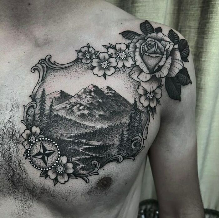 Mountains and flowers tattoo