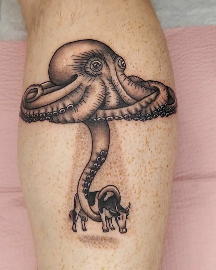 Weird squid and cow leg tattoo 