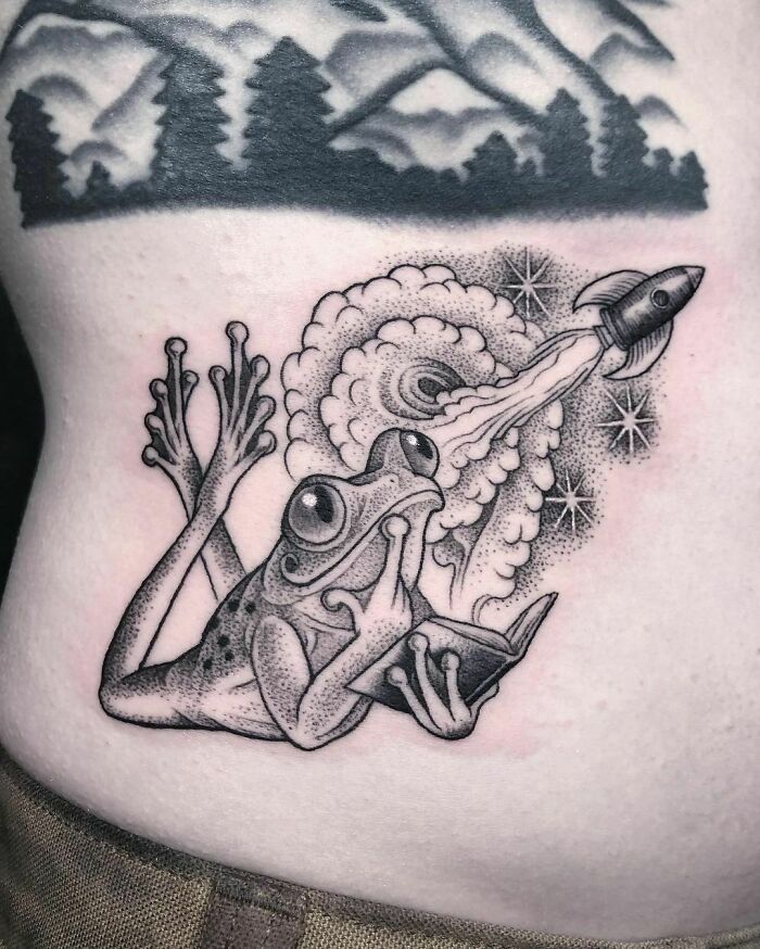 Sci-Fi Reading Frog belly tattoo 