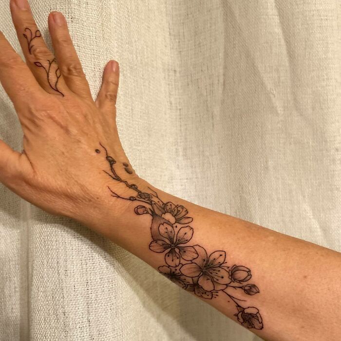 Cherry Blossom hand tattoo 