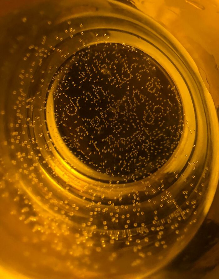 The Bubbles At The Bottom Of My Water Glass Look Like A Script Of Some Kind