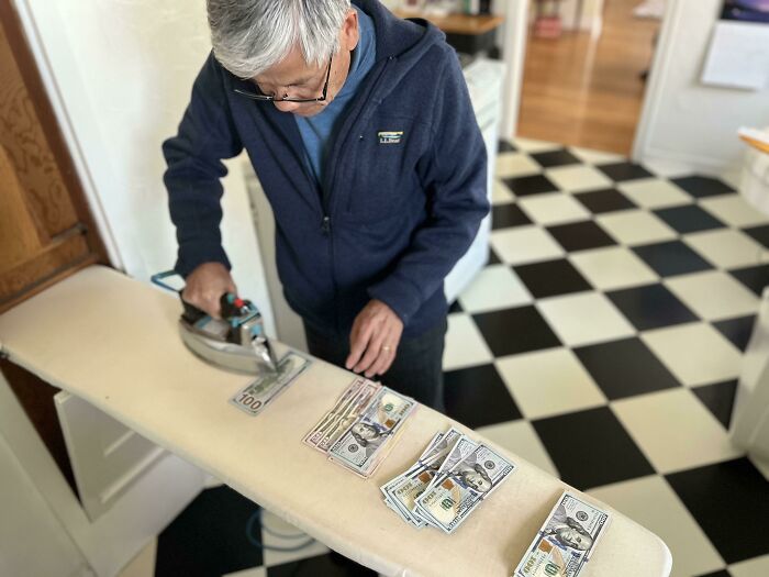 My Dad Ironing American Cash Before A Trip To The Old Country
