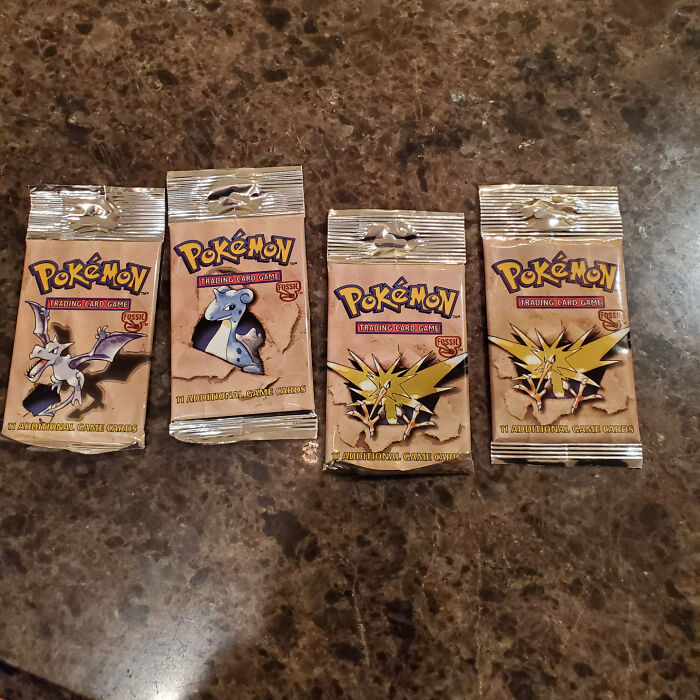 Found 4 Unopened Packs Of Pokemon Cards From 1999