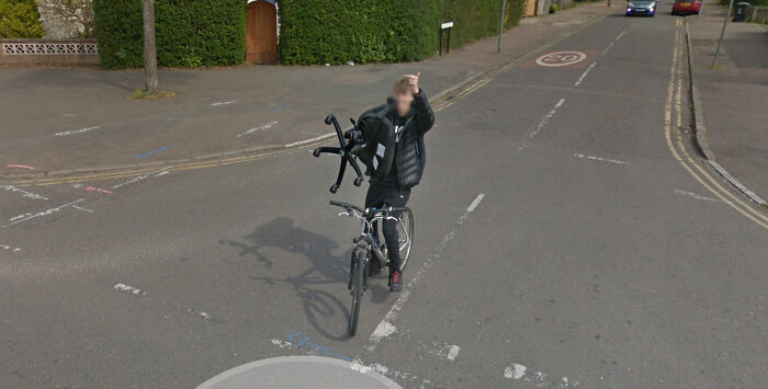 House Hunting In The UK And Found This Bloke Biking With A Chair