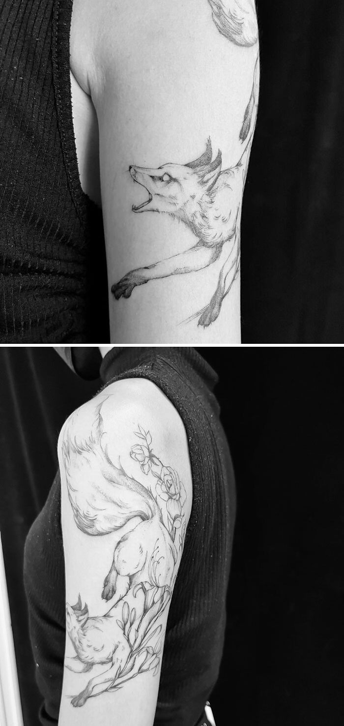 Fox and flowers arm tattoo
