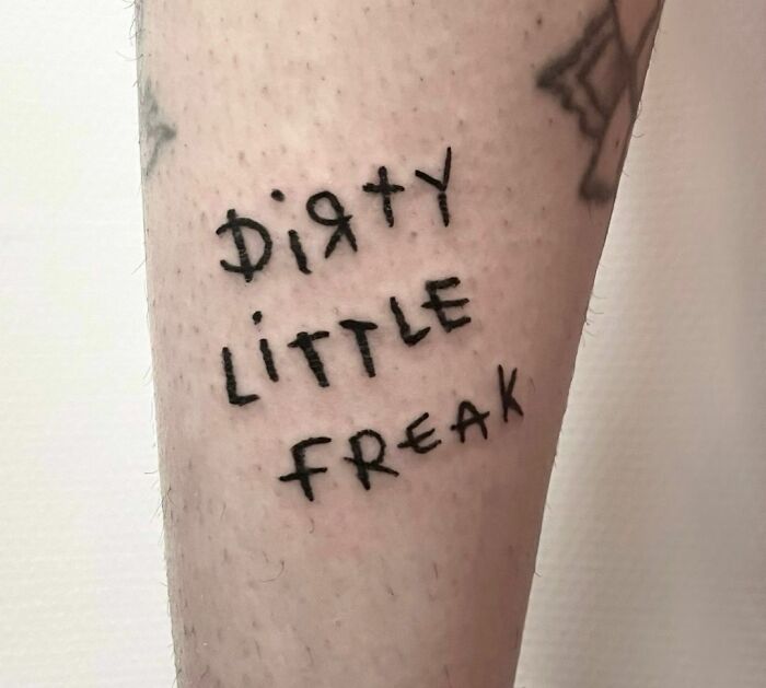 Funny word leg tattoo 