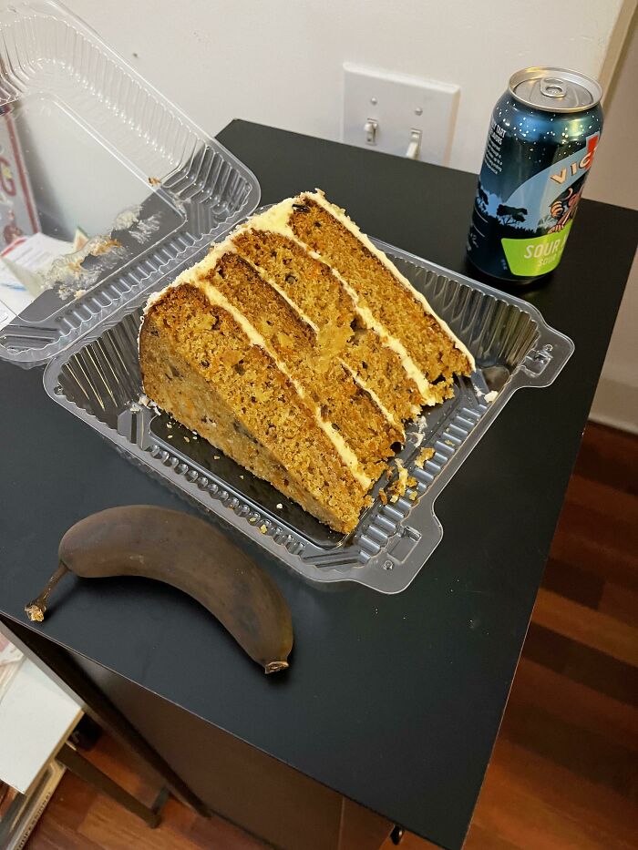 This Absolute Unit Of A Slice Of Carrot Cake I Got At A Local Bakery. Yes That’s A Standard Size Take Out Container (Banana For Scale)