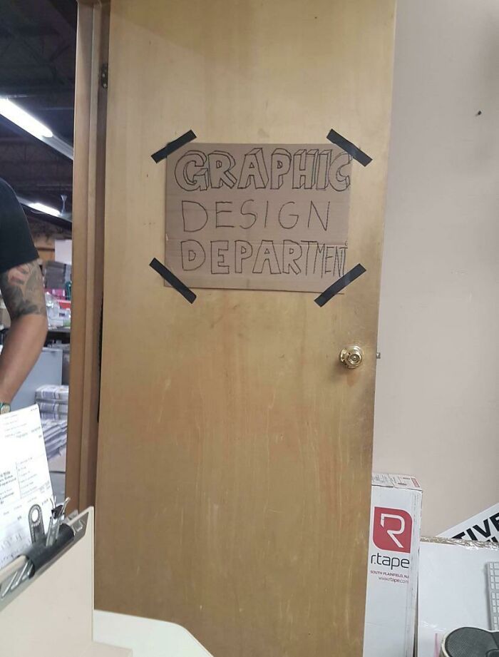The Sign On My Husbands Graphic Design Department