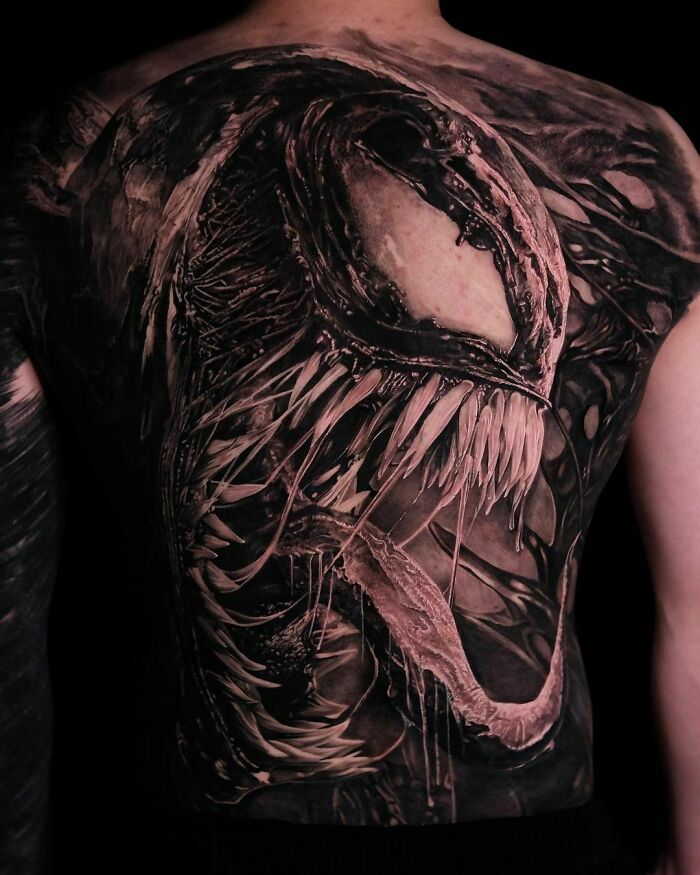 Venom back tattoo 