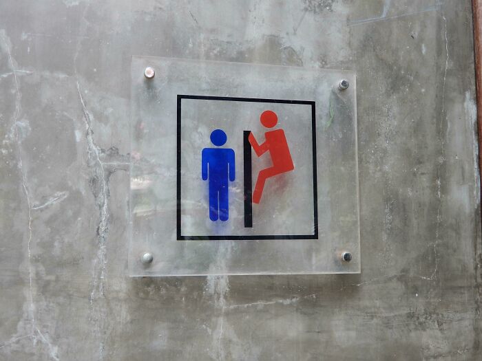 Any Idea What This Bathroom Sign Is Trying To Say?