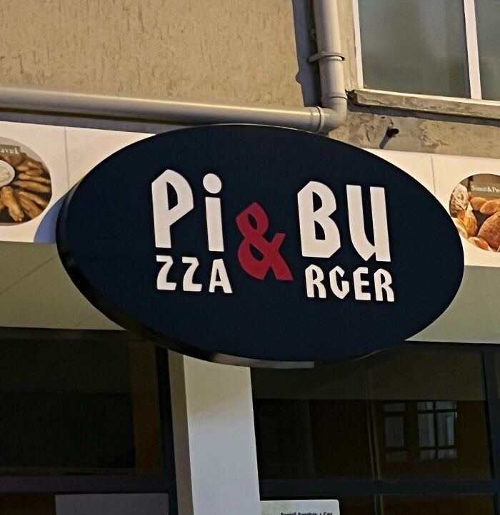 A Fast-Food Place Signboard (With A Poor Choice Of Word Layout)