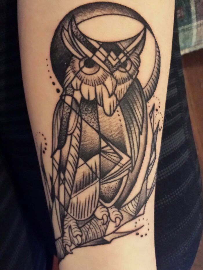 Geometric owl and moon forearm tattoo
