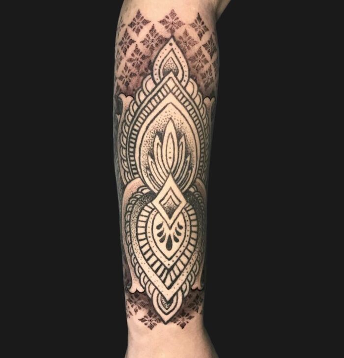Geometric arm tattoo