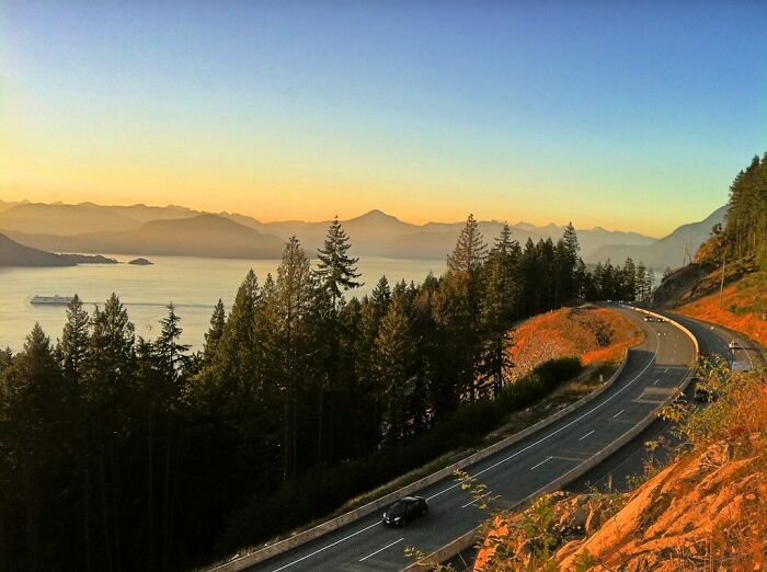 Picture of Sea to Sky Highway road with car and forest near