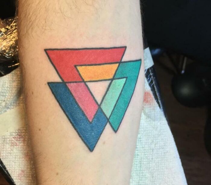 Colorful triangles tattoo