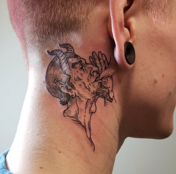 ear tattoo of whispering devil