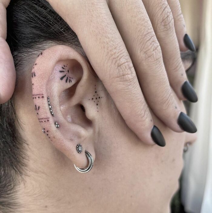 ear tattoo of a dot pattern