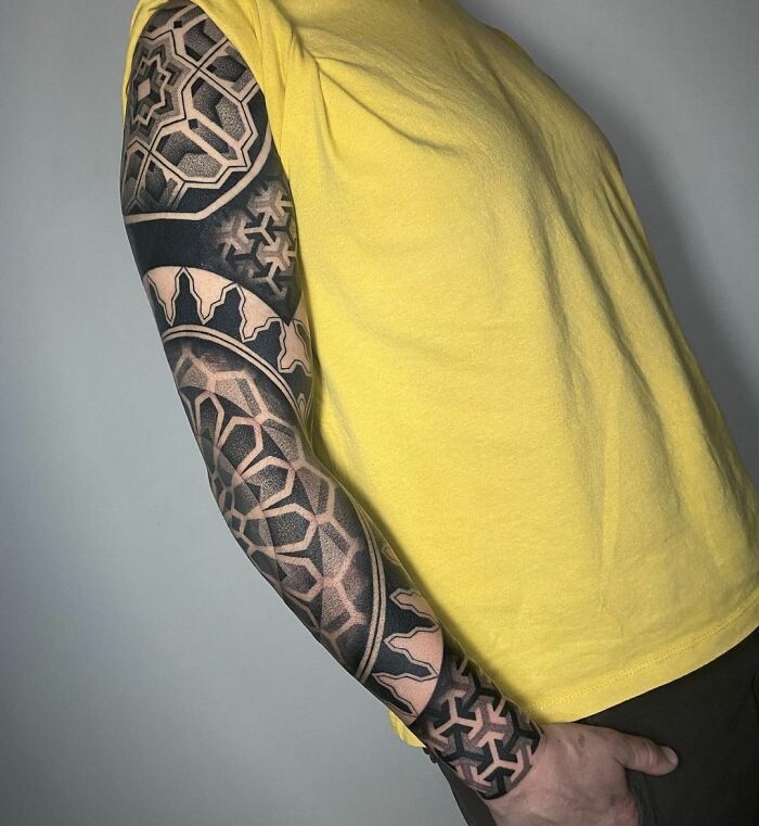 Abstract geometric black right arm sleeve tattoo