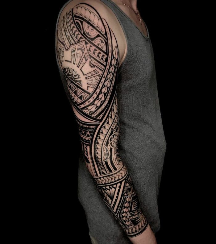 Polynesian style geometric abstract black right arm sleeve tattoo