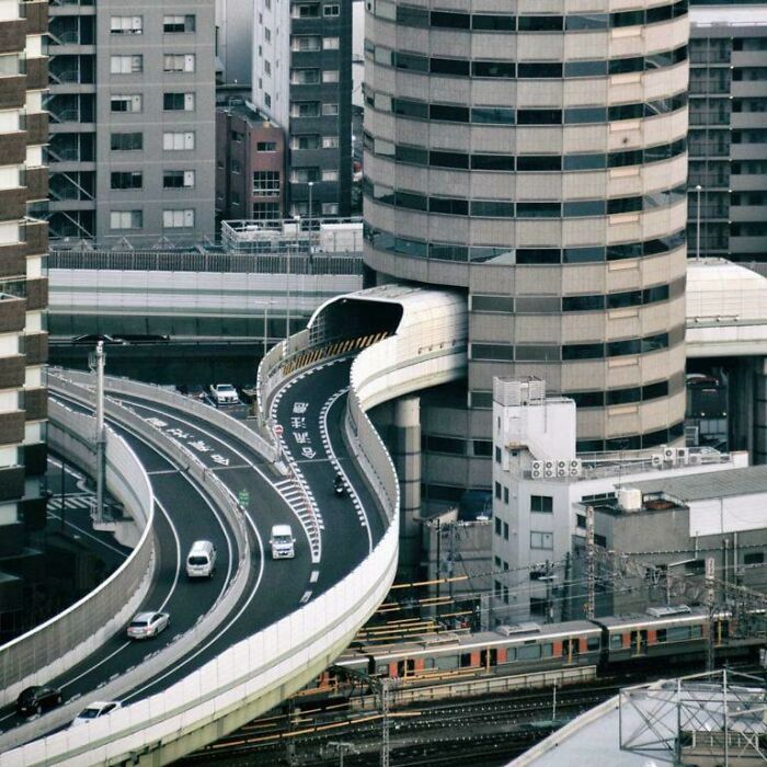 Gate Tower Building – Osaka Japan . Yes That Is A Highway Going Through A Building !!!