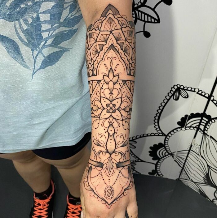 Geometric abstract half arm sleeve tattoo