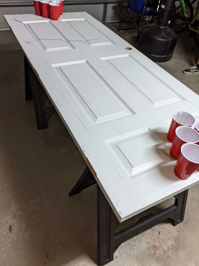 Friend Made Beer Pong Table Out Of A Door His Dad Kicked In, Thought It Belonged Here