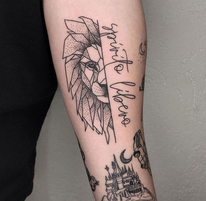 Geometric lion tattoo on arm with cursive text, showcasing creativity.