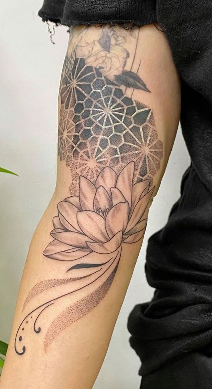 Lotus flower and geometry tattoo
