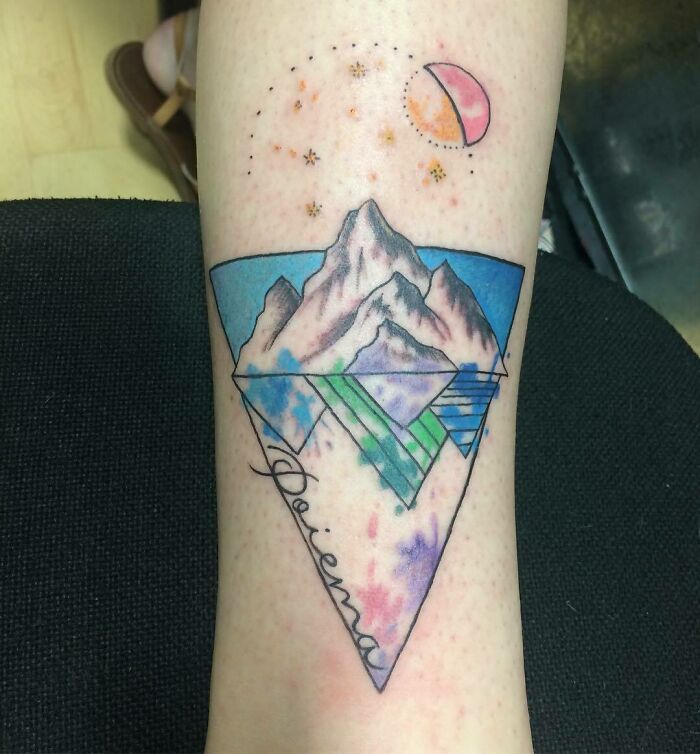 Geometric mountain and moon tattoo