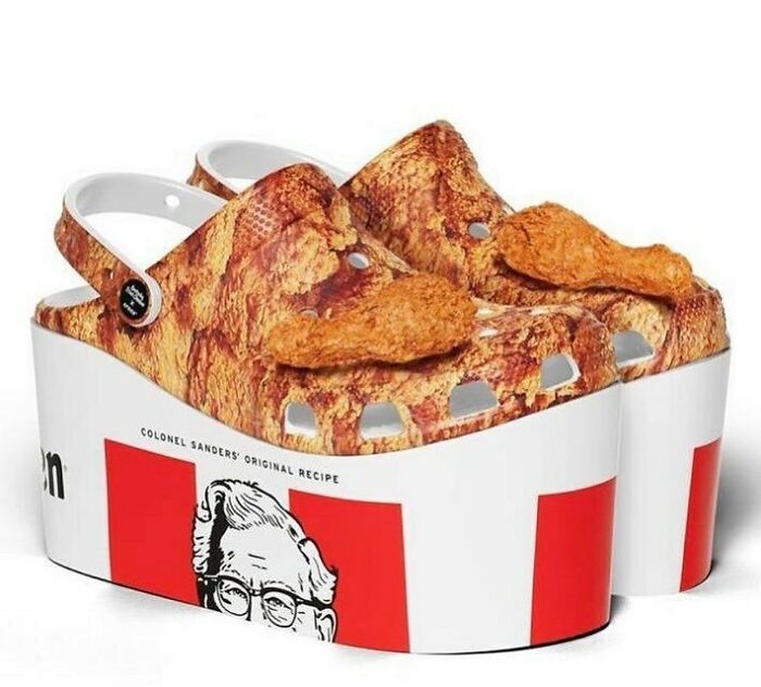 Weird shoes shaped like fried chicken on platform soles with a fast-food theme.