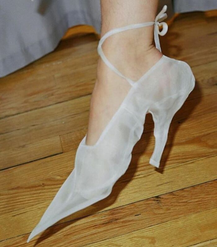 Unique, pointed shoe design in translucent material, showcasing one of many weird shoes that exist.