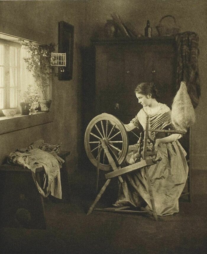 Portrait Of Woman At Her Spinning Wheel, Titled “Spinning” By Emilie V. Clarkson⁣, New York, Circa 1901