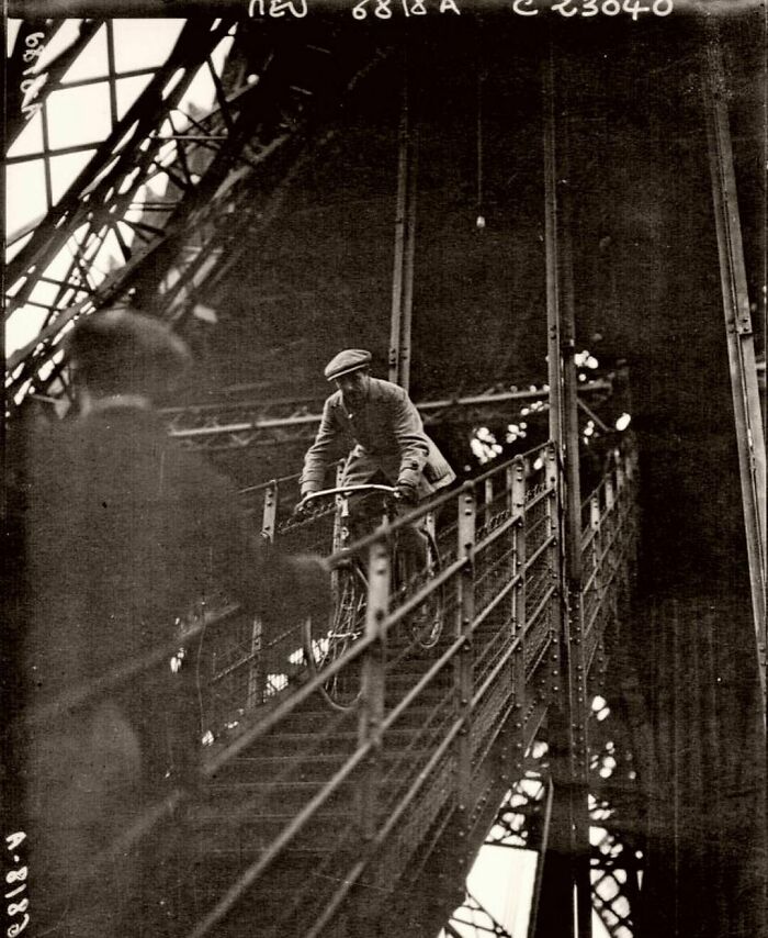 1923. Pierre Labric Rides His Bicycle Down The Stairs Of The Eiffel Tower. He Won A Bet, But Was Arrested By The Police