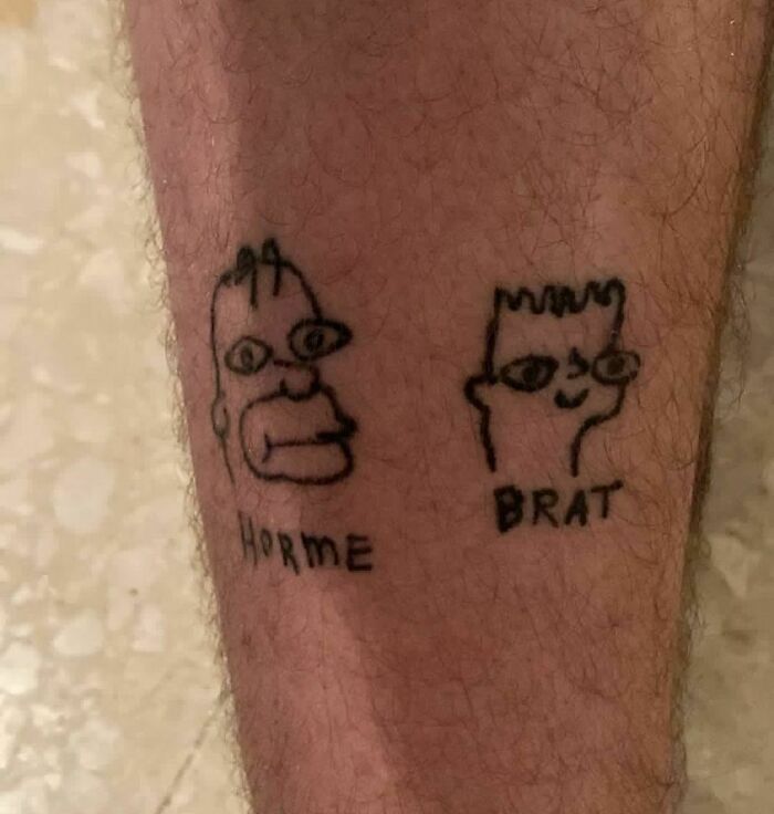 Poorly drawn tattoos of cartoon characters on a leg, highlighting bad tattoo decisions.