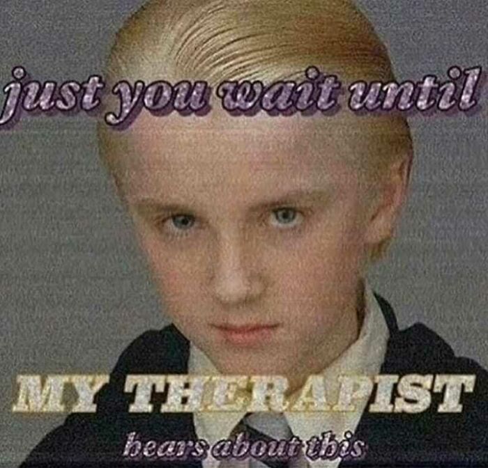Blond child with a stern look. Text reads, "Just you wait until my therapist hears about this," creating a humorous meme.