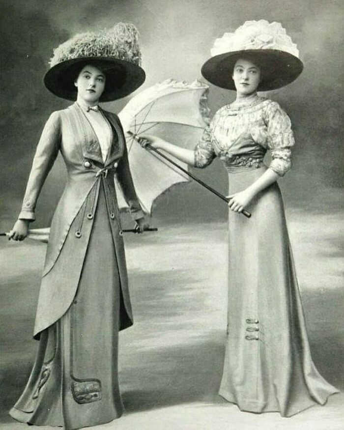 A Couple Of Tall Edwardian Ladies ( Possibly Sisters) Wearing The Latest Finery Of That Period: Les Modes (Paris) April 1909 “Promenade Toilet And Shopping Dress By Bernard”. Circa 1910