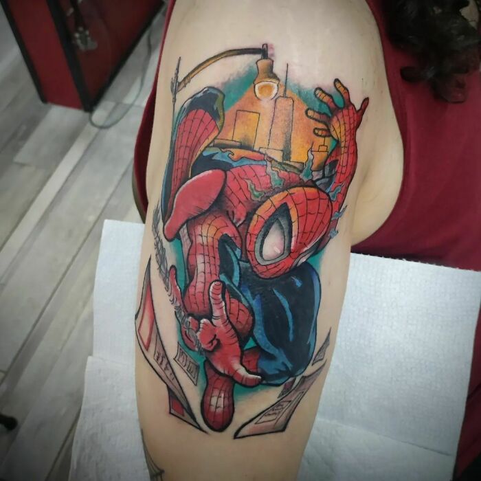 Spiderman throwing web tattoo 